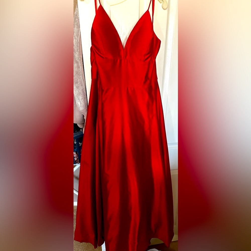 Red floor length Gown with spaghetti straps and pockets